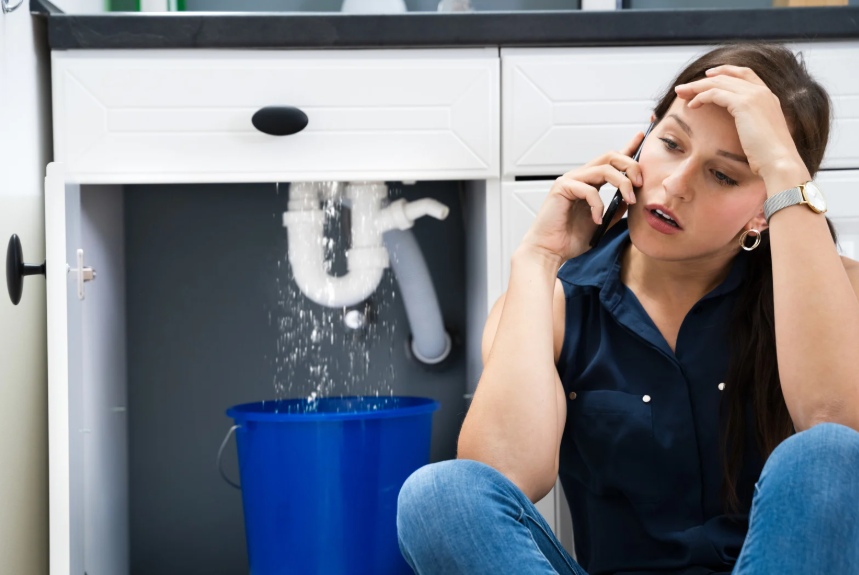 Woman calling plumbing heating services Toronto
