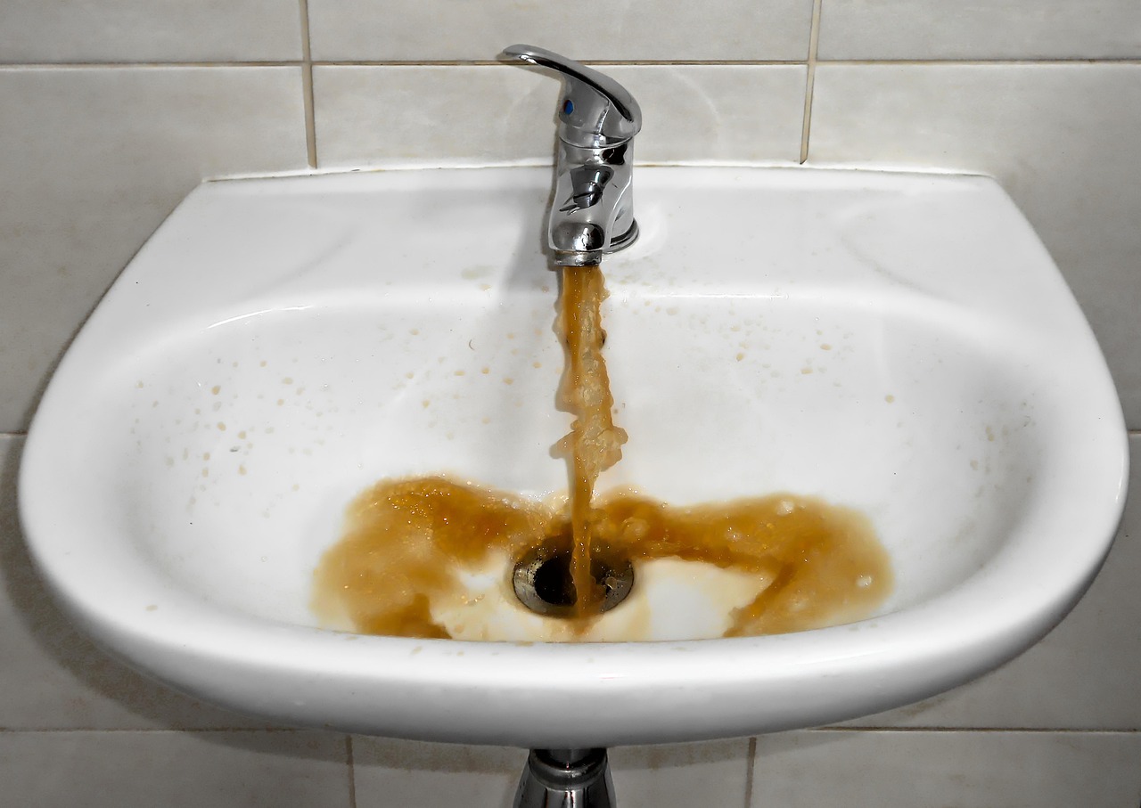 dirty water sink plumbing-heating services