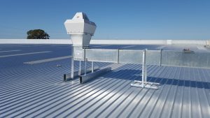 metal roof with commercial HVAC service
