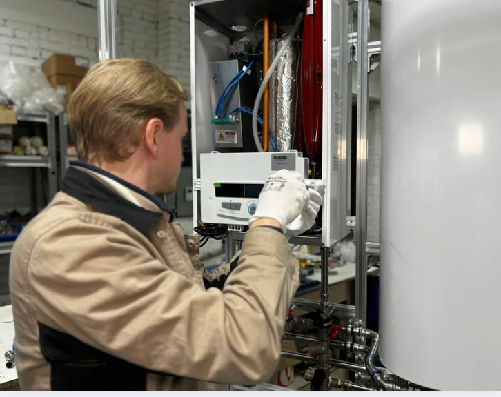 man doing furnace repair toronto