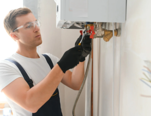 man doing boiler tune up